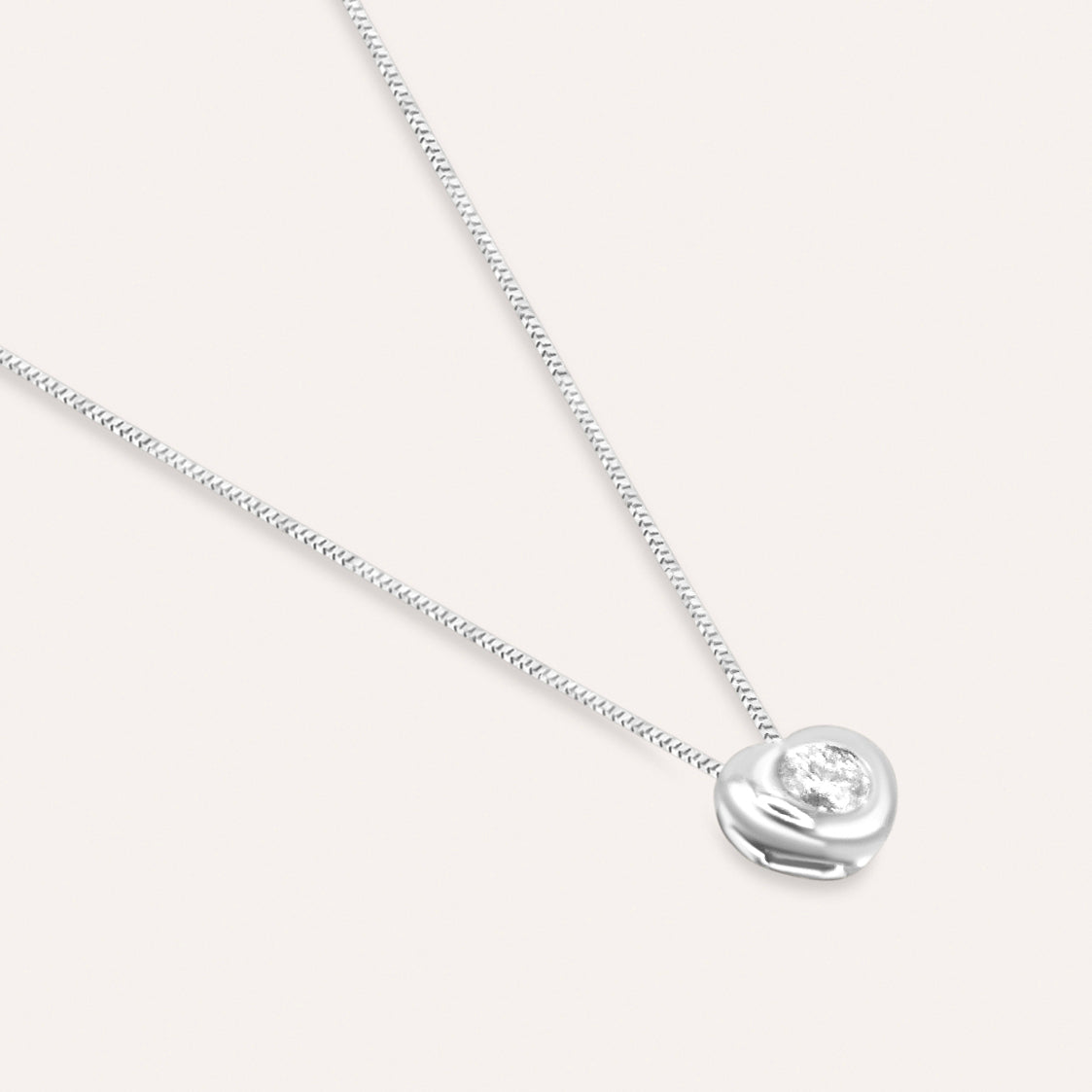 Diamond and white gold heart solitaire necklace