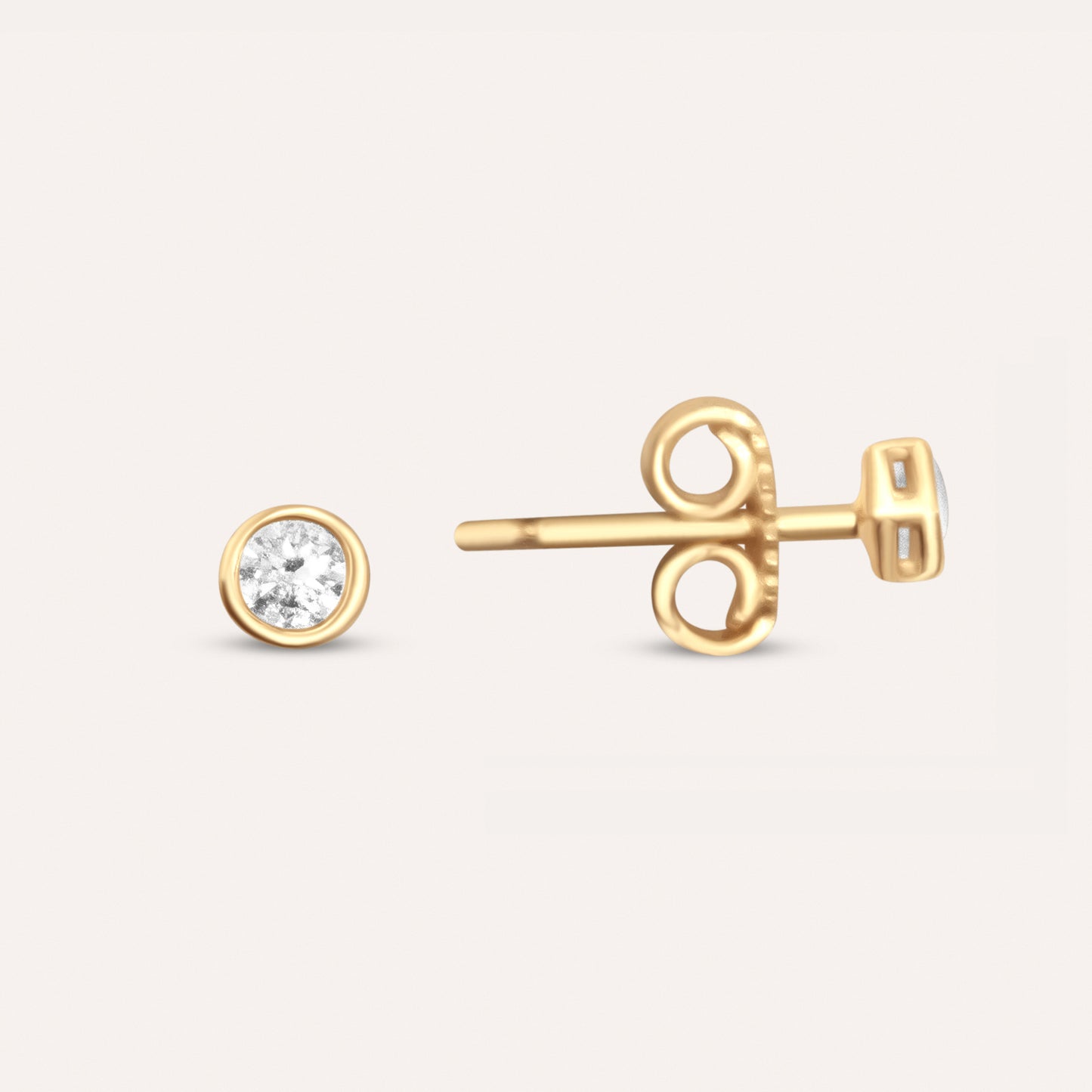 Diamond and gold solitaire studs