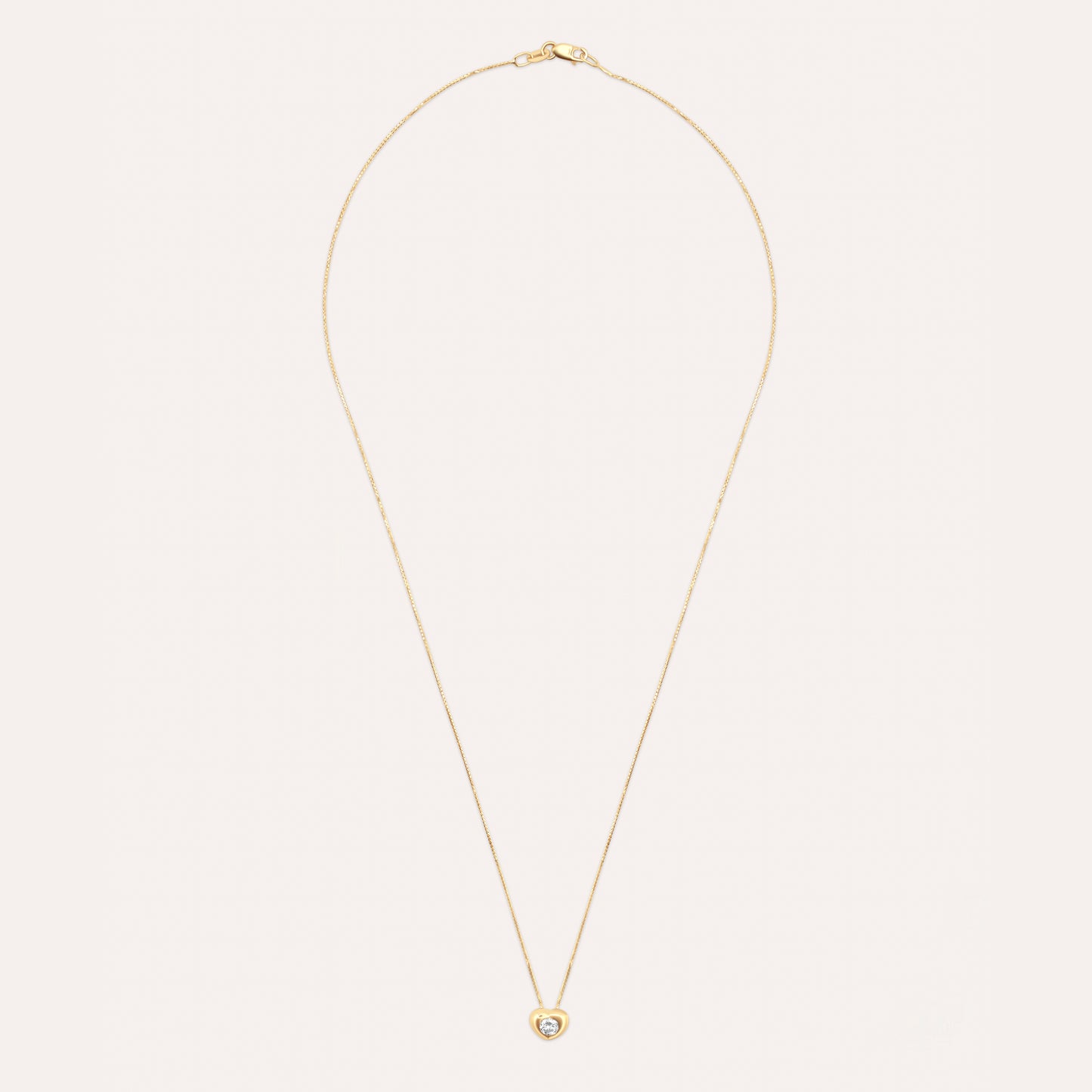 Diamond and gold heart solitaire necklace
