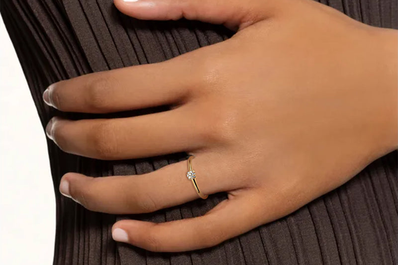Diamond and gold Orla drop solitary ring