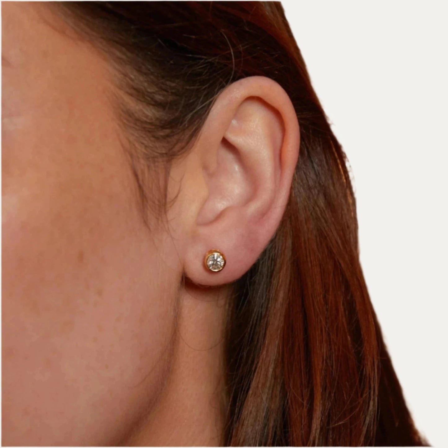 Diamond and gold solitaire studs