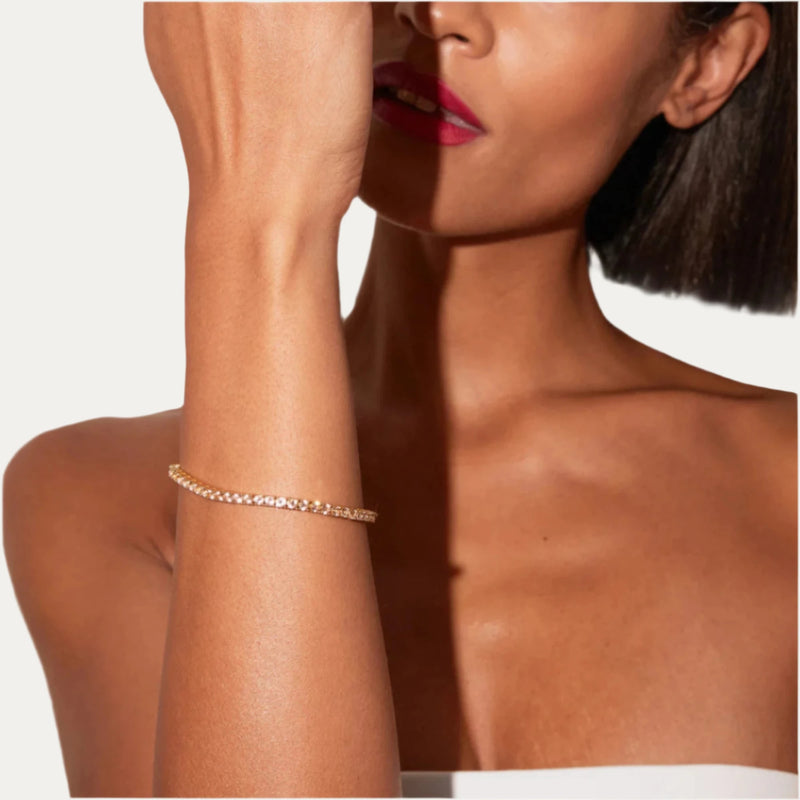 Diamond and gold tennis bracelet