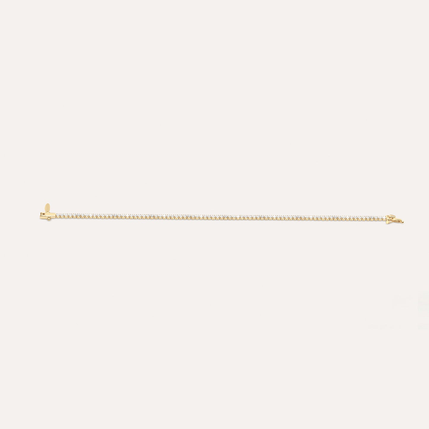 Diamond and gold tennis bracelet