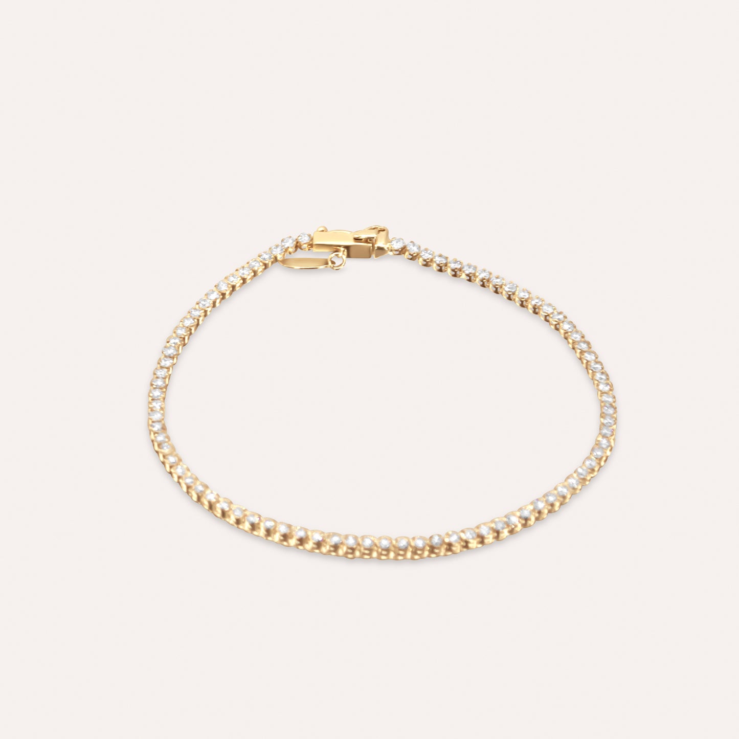 Diamond and gold tennis bracelet