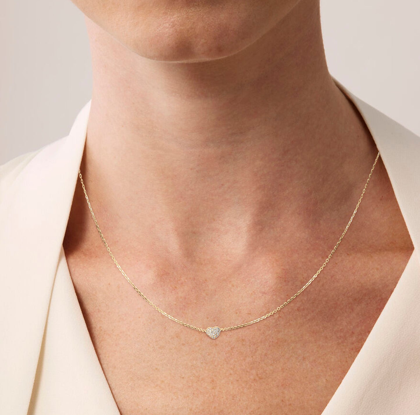 Diamond and gold heart necklace